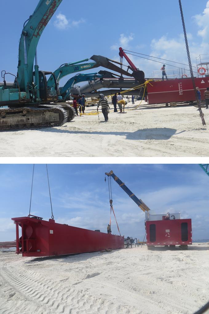 Engineers installing 浚渫船 components